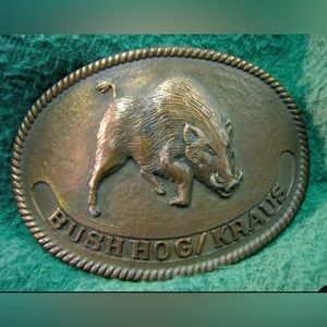 VINTAGE BUSH HOG KRAUS BRASS TONE BELT BUCKLE W/ WESTERN ROPE BOARDER.